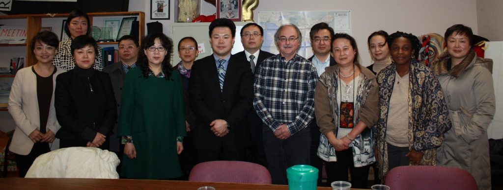 Chinese delegation at Injured Workers Consultants clinic.  delegation with Deputy Director Yufei, centre, and to the right IWC staff John McKinnon, Rebecca Lok and Audrey Parkes