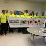 Cornwall labour & injured workers hold JRB banner