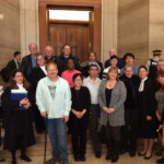 Group shot of ONIWG,injured workers and IAVGO legal team outside the Supreme Court