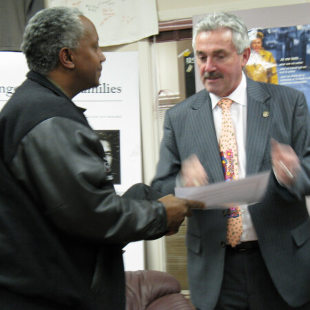MPP Michael Prue presents certificate to 2011 graduate MPP Michael Prue presents certificate to 2011 graduate